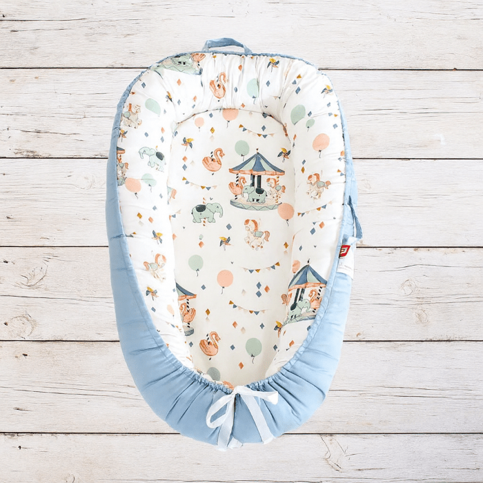 Réducteur de lit bébé doux bleu pastel carnaval