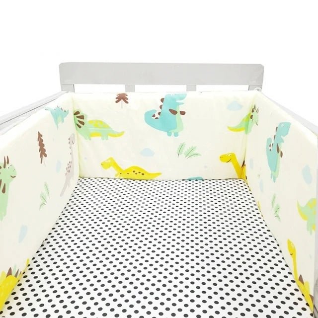 tour de lit pour bebe couleurs douces motifs joyeux dinosaures