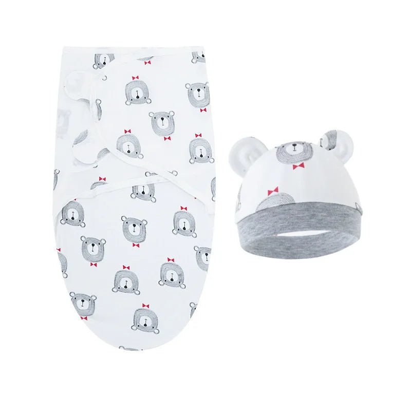 Couverture emmaillotage oursons blancs offrant douceur adorable.