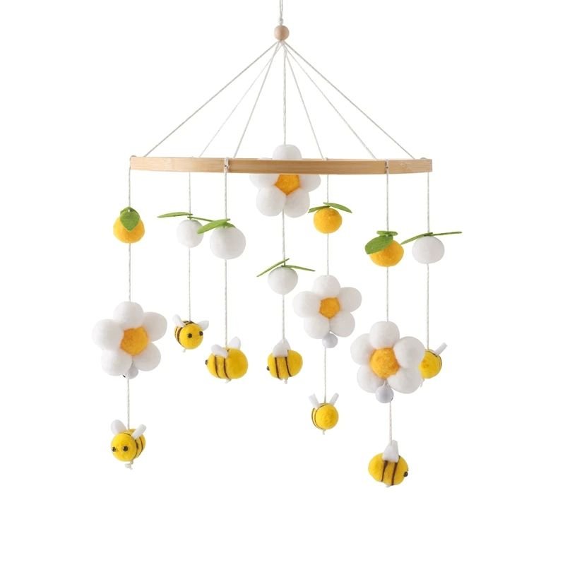 Mobile bébé fleurs blanches, abeilles jaunes et feuilles décoratives.