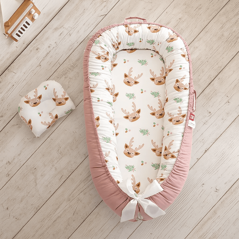 reducteur de lit bebe cocon facile trasnporter cerf reve