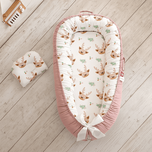 reducteur de lit bebe cocon facile trasnporter cerf reve