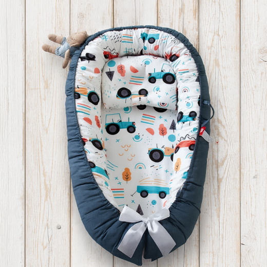 reducteur de lit bebe favorise auto apaisement