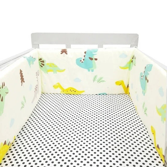 tour de lit pour bebe couleurs douces motifs joyeux dinosaures