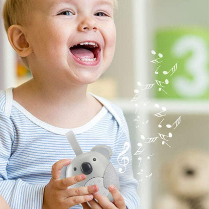 fille heureuse avec sa veilleuse bruit blanc koala